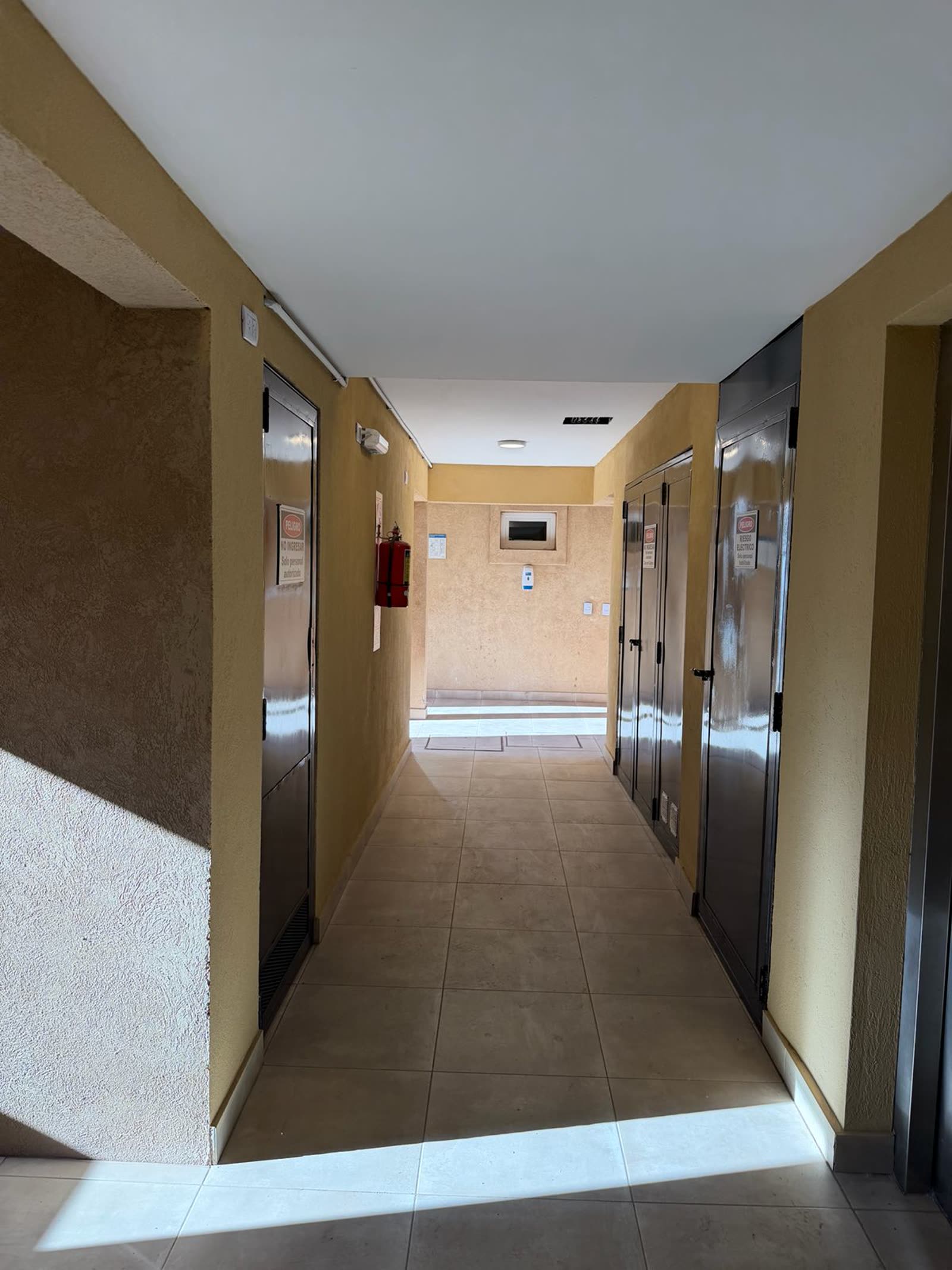 Pasillo de acceso a unidades — interior de Pampa III